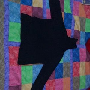 Victor Alfaro black turtle neck